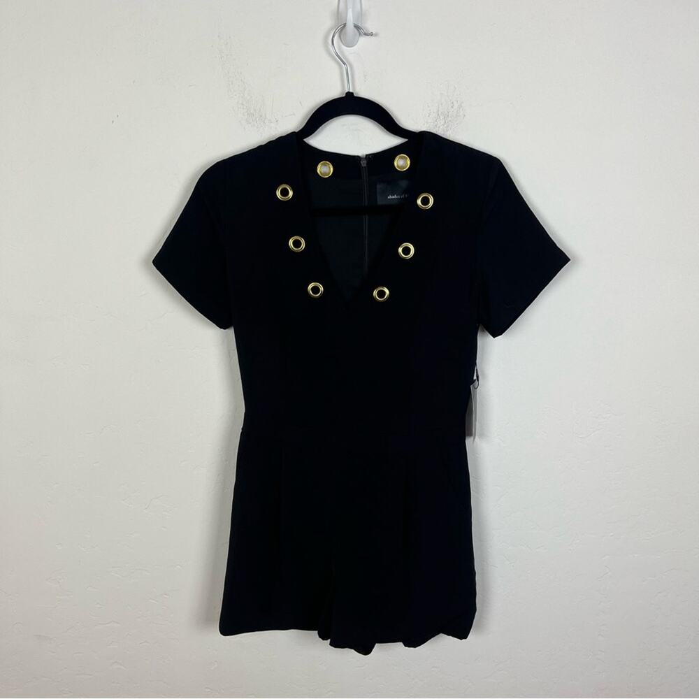 Shades of Blonde Black Grommet Romper
